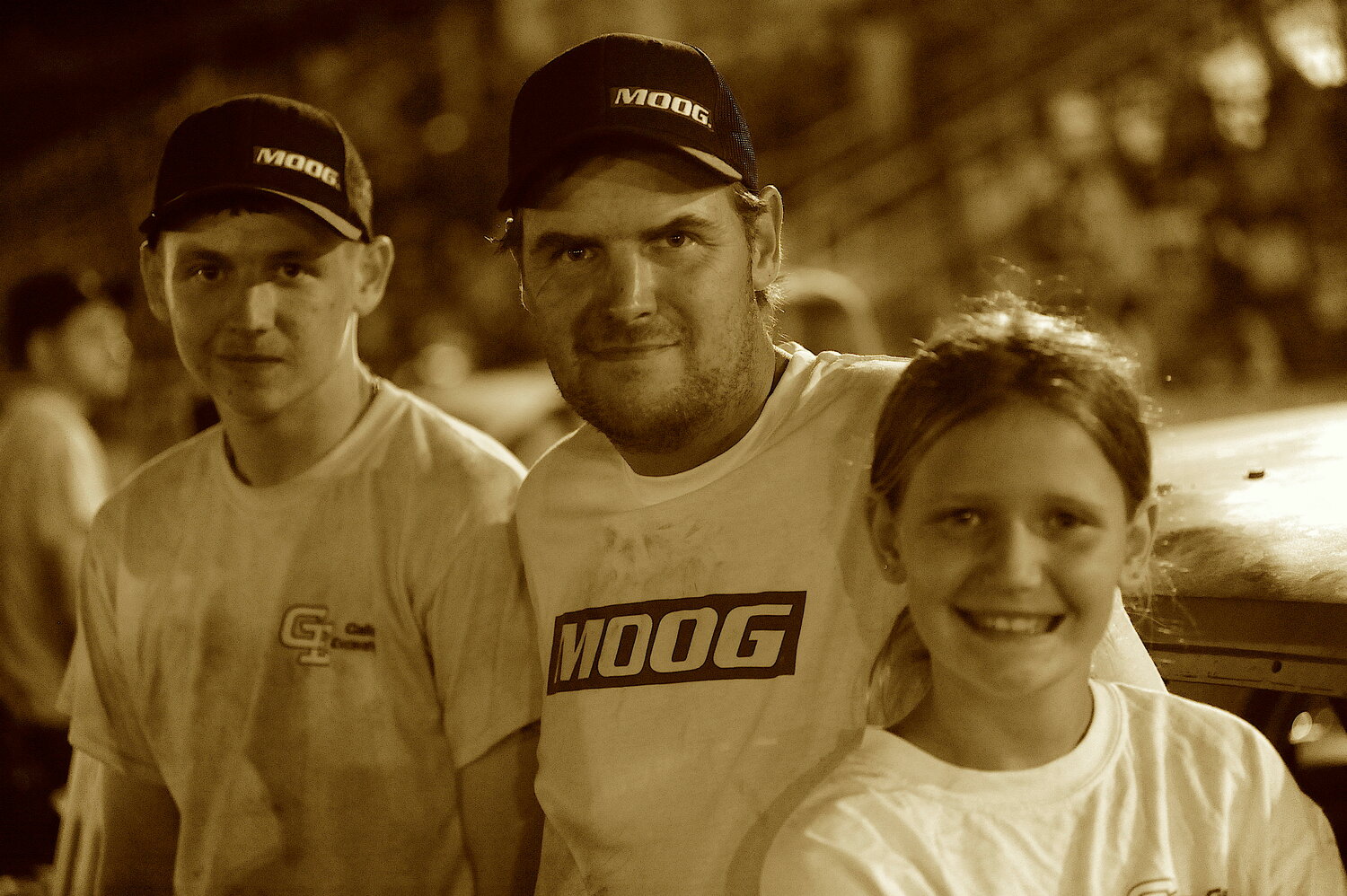 A family sport. Dan Houghtaling (center) is pictured with his 11-year-old daughter Mackenzie, who hopes to make a name for herself next racing season at Bethel Motor Speedway...
